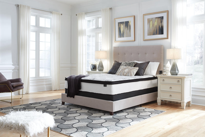 Ashley Furniture Chime 12-inch hybrid mattress in a box, showing the comfortable, layered mattress design with plush fabric cover.