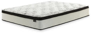 Ashley Furniture Chime 12-inch hybrid mattress in a box, showcasing a plush, supportive sleeping surface with quilted top and foam layers.