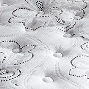 Ashley Furniture Chime 12-inch hybrid mattress in a box, showing plush surface with quilted top and supportive layers.