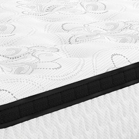Ashley Furniture Chime 12-inch hybrid mattress in a box, showing the plush surface and supportive design for restful sleep.