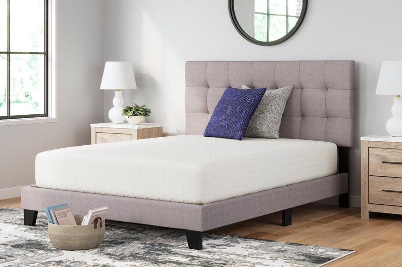 Ashley Furniture Chime 12-inch memory foam mattress in a box, showcasing plush surface and clean design for restful sleep.