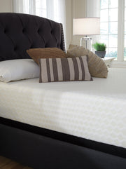 Ashley Furniture Chime 12-inch memory foam mattress in a box, showcasing plush surface and clean design for restful sleep.