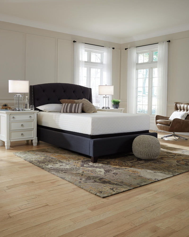 Ashley Furniture Chime 12-inch memory foam mattress in a box, showcasing the plush, supportive surface and neatly rolled design.