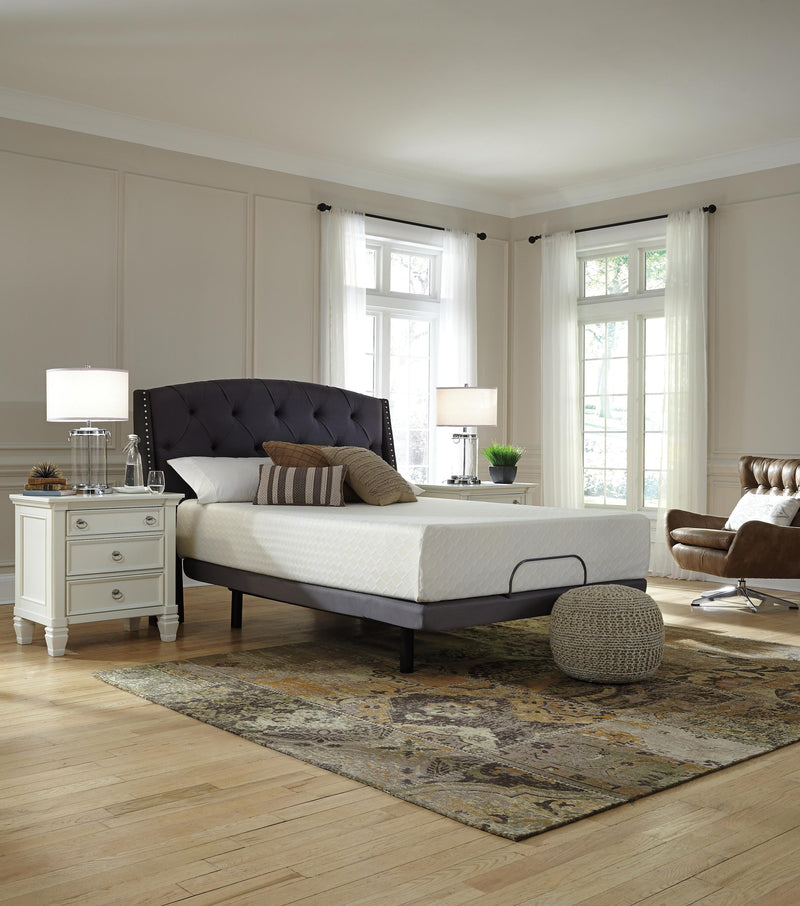 Ashley Furniture Chime 12-inch memory foam mattress in a box, showing the plush, white mattress with a smooth surface and supportive design.