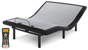 Ashley Furniture Chime 12-inch California King hybrid mattress set with pillows, shown on a bed frame in a cozy bedroom setting.