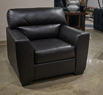 Ashley Furniture Glennbre Chair with plush upholstery and modern design, shown in a stylish living room setting.