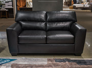 Ashley Furniture Glennbre loveseat with plush fabric and cushioned armrests, perfect for cozy living room seating.