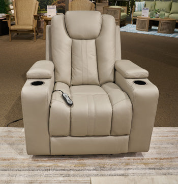 Ashley Furniture Elevate Edges glider recliner in closed position with plush upholstery and padded armrests.