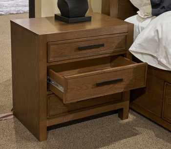 Ashley Furniture Dacylyn nightstand with a closed drawer and wood finish, featuring a modern design for bedroom storage.
