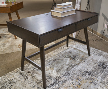 Ashley Furniture Dantenton 46-inch home office desk with a spacious work surface and modern design for productivity.
