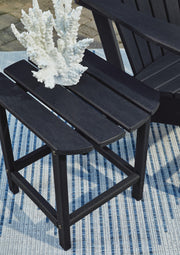 Ashley Furniture Sundown Treasure outdoor seating set with cushioned chairs and a central table, designed for patio relaxation.