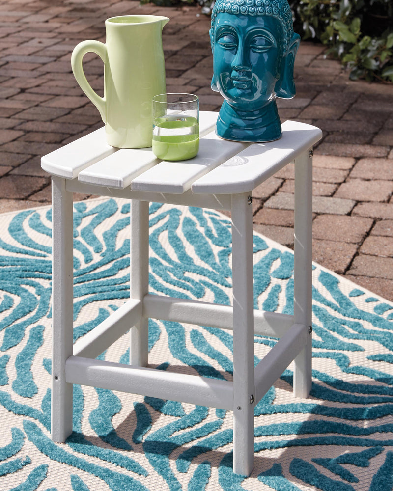 Ashley Furniture Sundown Treasure outdoor seating set with a table and chairs, perfect for patio or garden relaxation.