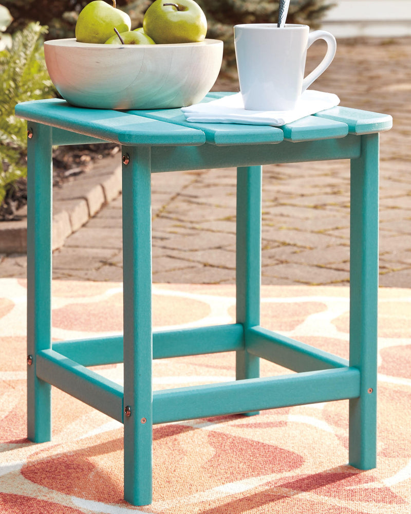 Outdoor seating set by Ashley Furniture with a table and chairs, ideal for patio or garden relaxation.