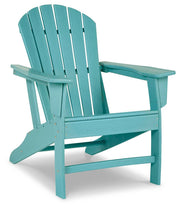 Ashley Furniture Sundown Treasure outdoor seating set with table, featuring woven chairs and a rectangular table in a garden setting.