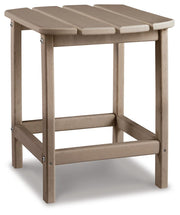 Ashley Furniture Sundown Treasure outdoor seating set with cushioned chairs and a table, ideal for patio relaxation.