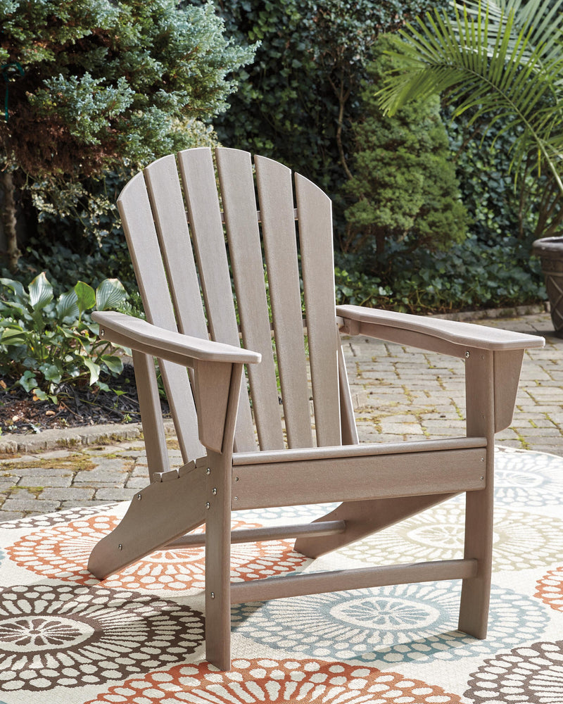 Outdoor Sundown Treasure seating set with table and chairs by Ashley Furniture, perfect for patio outdoor dining and relaxation.