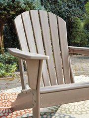 Outdoor seating set with table and chairs from Ashley Furniture's Sundown Treasure collection, ideal for outdoor dining and relaxation.