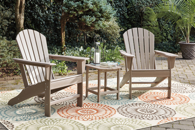 Ashley Furniture Sundown Treasure outdoor seating set with table and chairs, featuring woven design and plush cushions for outdoor comfort.