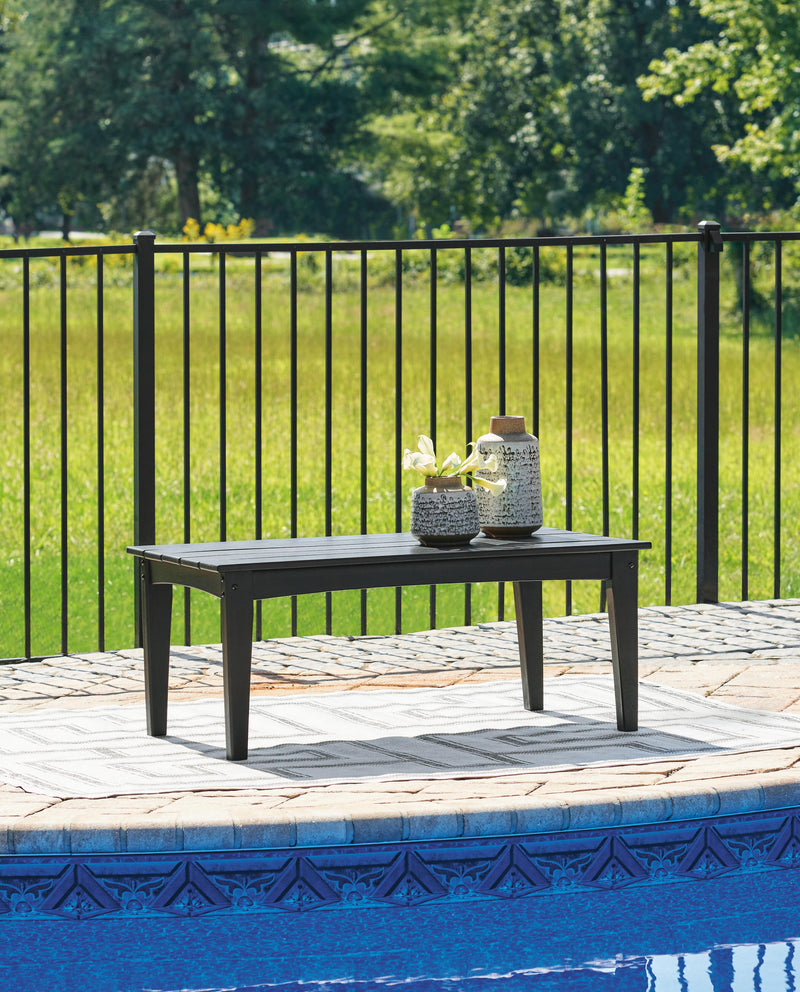 Outdoor cocktail table from Hyland Wave collection by Ashley Furniture with a sleek, modern design and sturdy outdoor-ready construction.