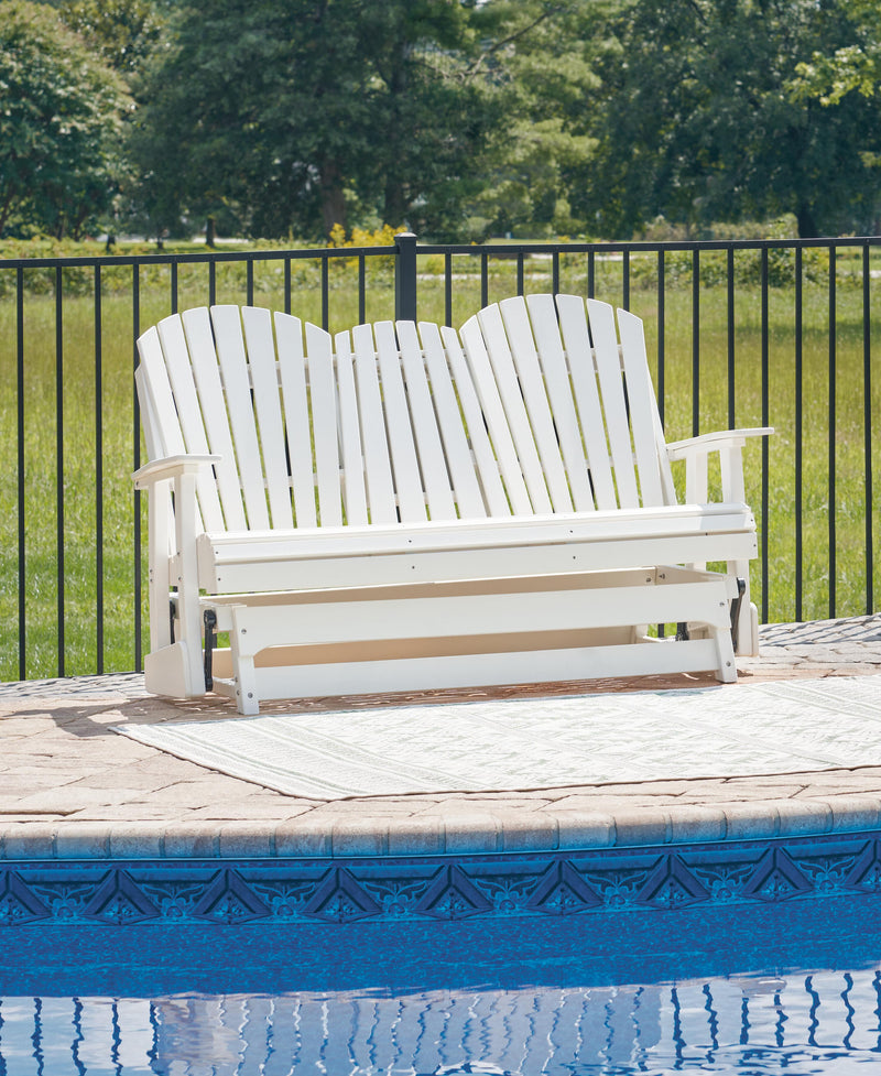 Ashley Furniture Hyland Wave outdoor glider loveseat with cushioned seating and wooden armrests, perfect for outdoor relaxing.