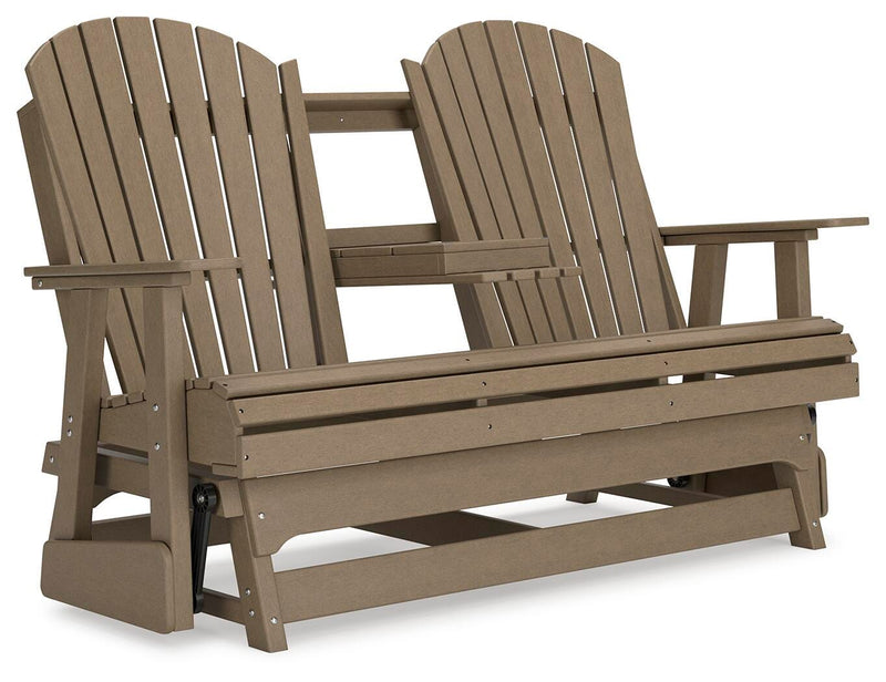 Ashley Furniture Hyland Wave outdoor glider loveseat with cushioned seating and a stylish, curved design for patio relaxation.