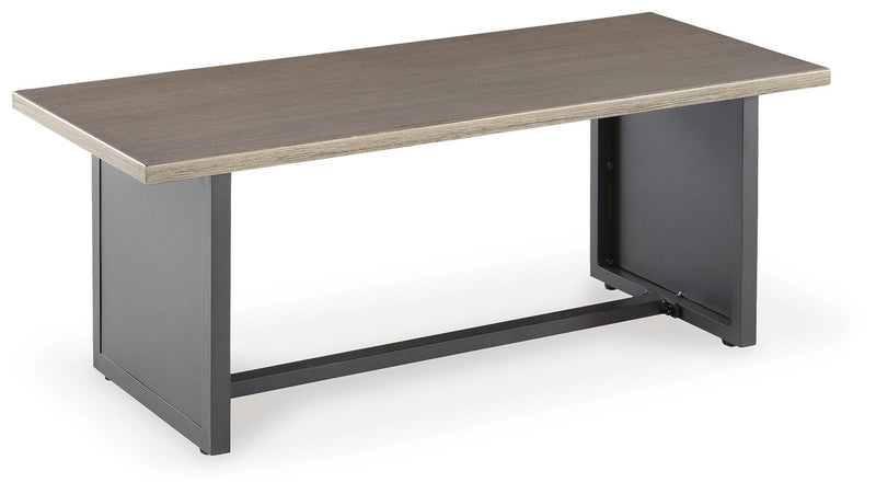 Ashley Furniture Bree Zee outdoor end table with a modern design, featuring a round top and sturdy metal frame for patio or garden use.