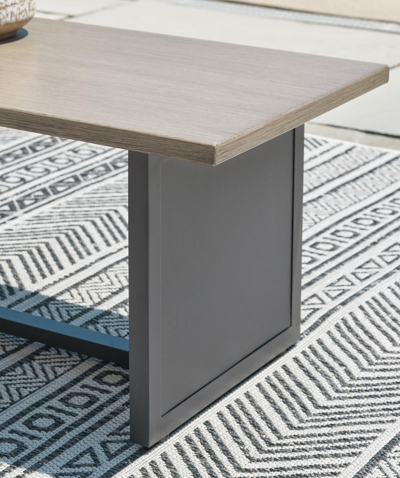 Ashley Furniture Bree Zee outdoor end table with a sleek design, perfect for patio or garden seating areas.