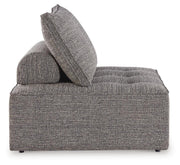 Ashley Furniture Bree Zee outdoor lounge chair with cushion, featuring a modern design and sturdy frame for comfortable outdoor seating.