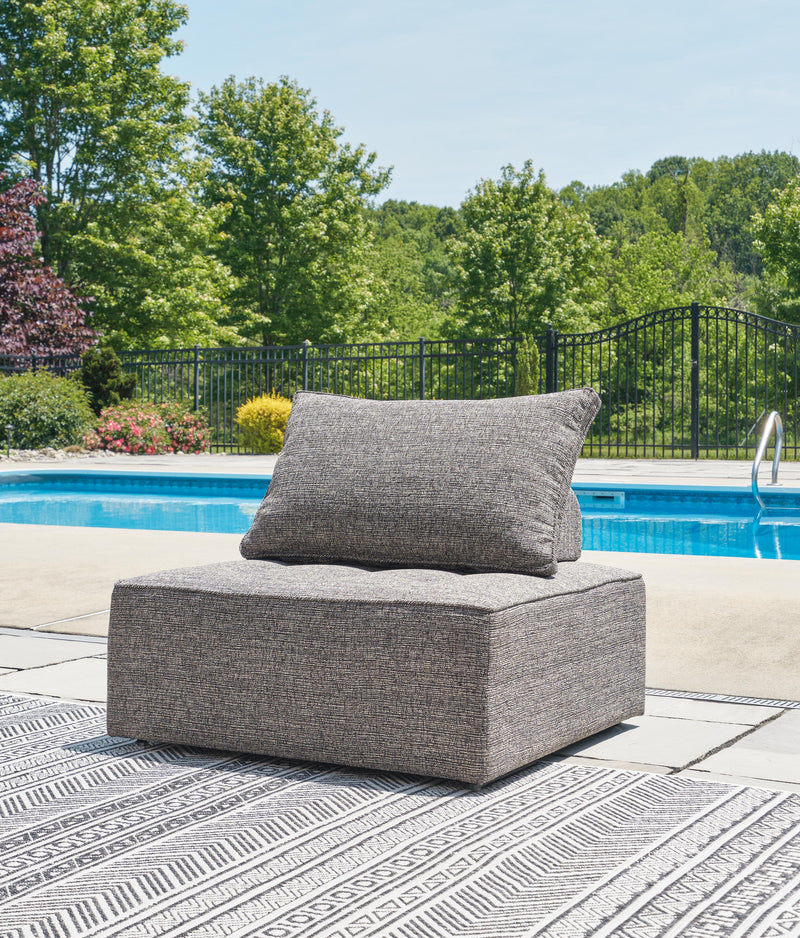 Ashley Furniture Bree Zee outdoor lounge chair with cushion, featuring a stylish design and comfortable seating for outdoor spaces.