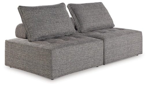 Ashley Furniture Bree Zee outdoor sectional with plush cushions and wicker frame, perfect for patio seating.