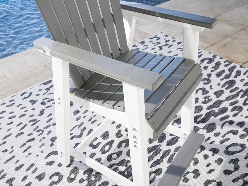 Outdoor dining set by Ashley Furniture featuring a table and chairs, perfect for outdoor entertaining and family meals.