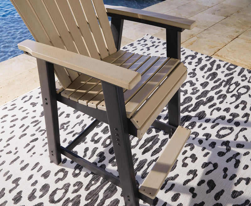 Ashley Furniture Fairen Trail outdoor dining set with a table and chairs, ideal for patio dining and outdoor gatherings.