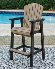 Ashley Furniture Fairen Trail outdoor dining set with a table and chairs, ideal for patio or garden outdoor dining spaces.