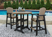 Fairen Trail outdoor dining set by Ashley Furniture with a table and four chairs in a garden setting.