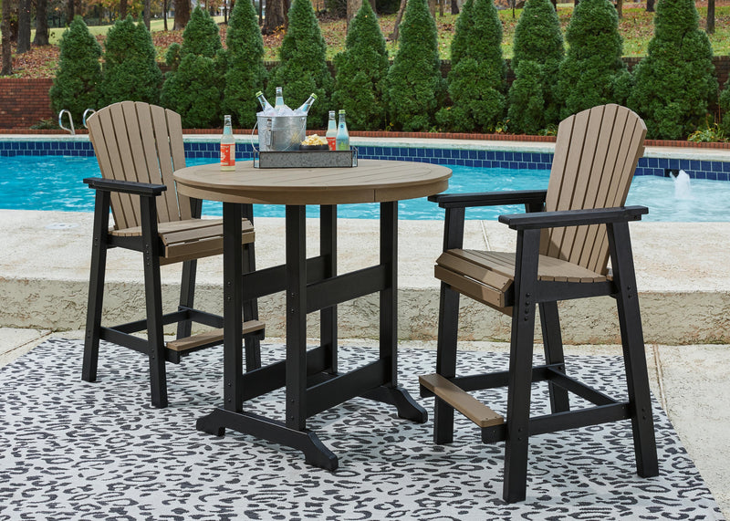 Fairen Trail outdoor dining set by Ashley Furniture with a table and four chairs in a garden setting.