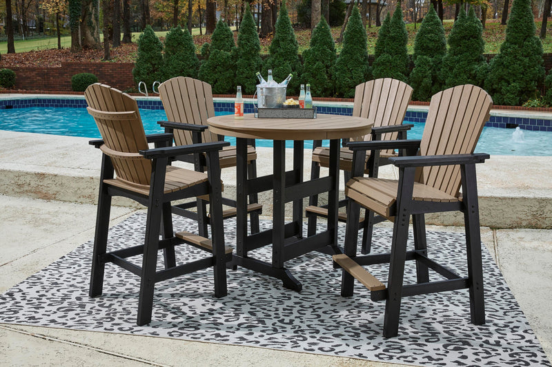 Ashley Furniture Fairen Trail outdoor dining set with a round table and six chairs, perfect for outdoor dining and gatherings.