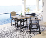 Ashley Furniture Fairen Trail outdoor dining set with a rectangular table and six matching chairs on a patio.