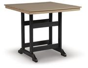 Ashley Furniture Fairen Trail outdoor dining set with a round table and six chairs, perfect for patio or garden dining.