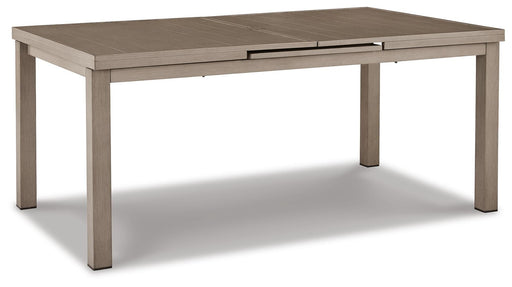 Outdoor patio dining table by Ashley Furniture with a sturdy wooden top and metal legs, perfect for beach front outdoor dining areas.