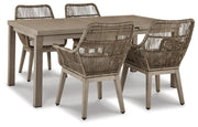 Outdoor dining set by Ashley Furniture featuring a beach front design with a table and chairs for outdoor gatherings.
