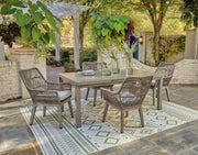 Beach front outdoor dining set by Ashley Furniture featuring a table and chairs for outdoor patio gatherings.