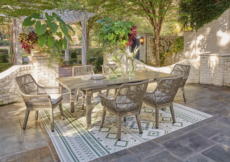 Ashley Furniture outdoor dining set with a table and chairs, designed for beach front outdoor spaces, featuring a stylish and durable design.