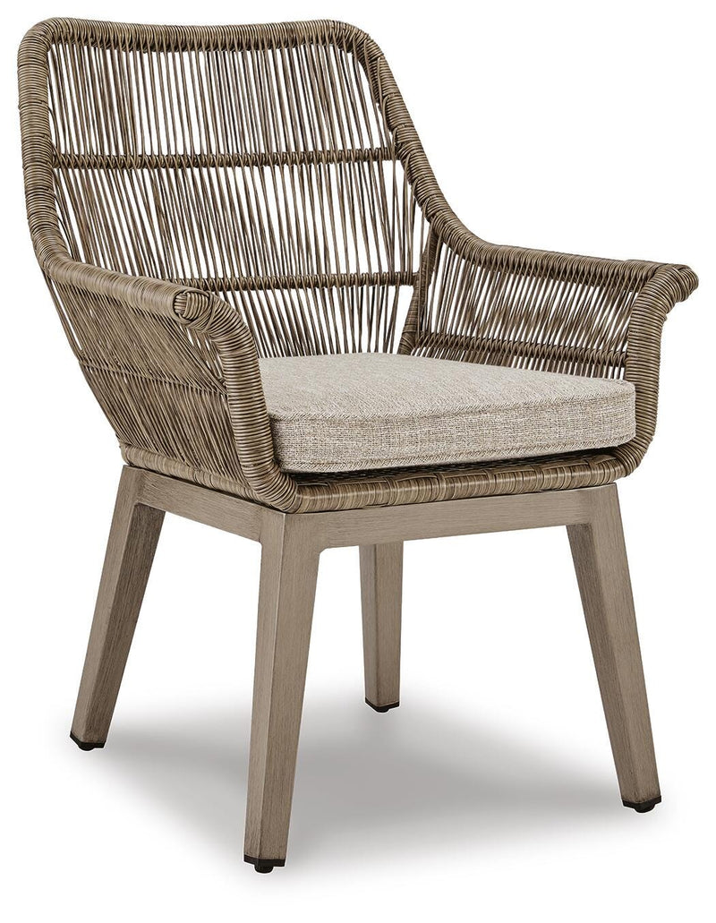 Outdoor dining set by Ashley Furniture featuring a beach front design with a table and chairs for outdoor gatherings.