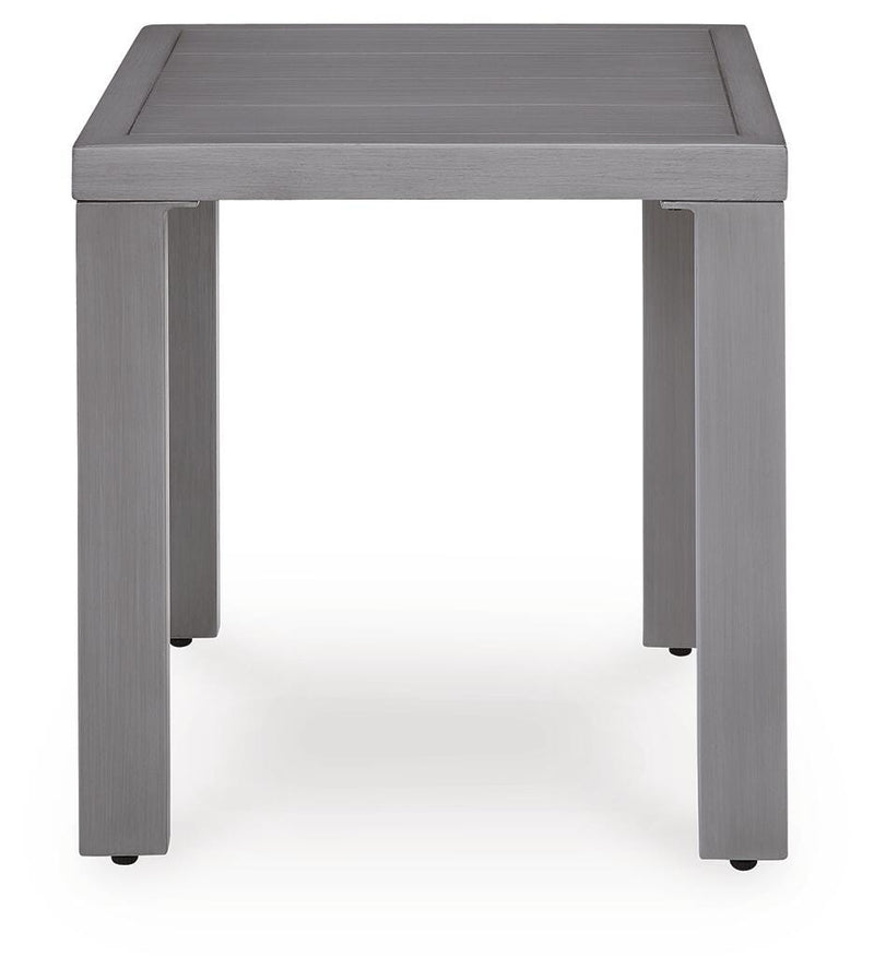 Ashley Furniture Half Moon Beach outdoor end table with a round wooden top and metal legs, perfect for patio or garden use.