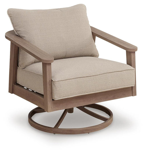 Outdoor swivel lounge chair with cushion from Ashley Furniture's Harmony Headlands collection, shown from an angled side view.