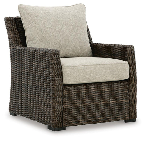 Ashley Furniture Brook Ranch outdoor lounge chair with cushion, featuring a stylish design and comfortable seating for outdoor spaces.