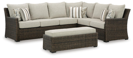 Ashley Furniture Brook Ranch outdoor sectional with cushioned benches, featuring three connected seating units and modern design.