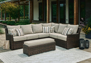 Ashley Furniture Brook Ranch outdoor sectional with cushioned benches, set of 3, featuring woven rattan design and plush seating.