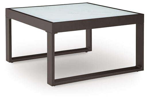 Ashley Furniture Beachloft outdoor cocktail table with slatted wood top and sturdy legs, perfect for patio or garden seating areas.