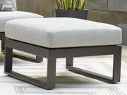 Outdoor sectional sofa from Ashley Furniture's Beachloft collection, featuring cushioned seats and stylish weather-resistant design.